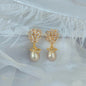 Pearl Bow Stud Earrings Women's High Sense